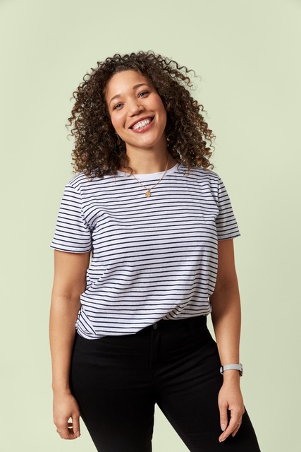 Woman smiling in an Allurion lifestyle photograph
